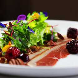 Duck breast salad with blackberry and pecan